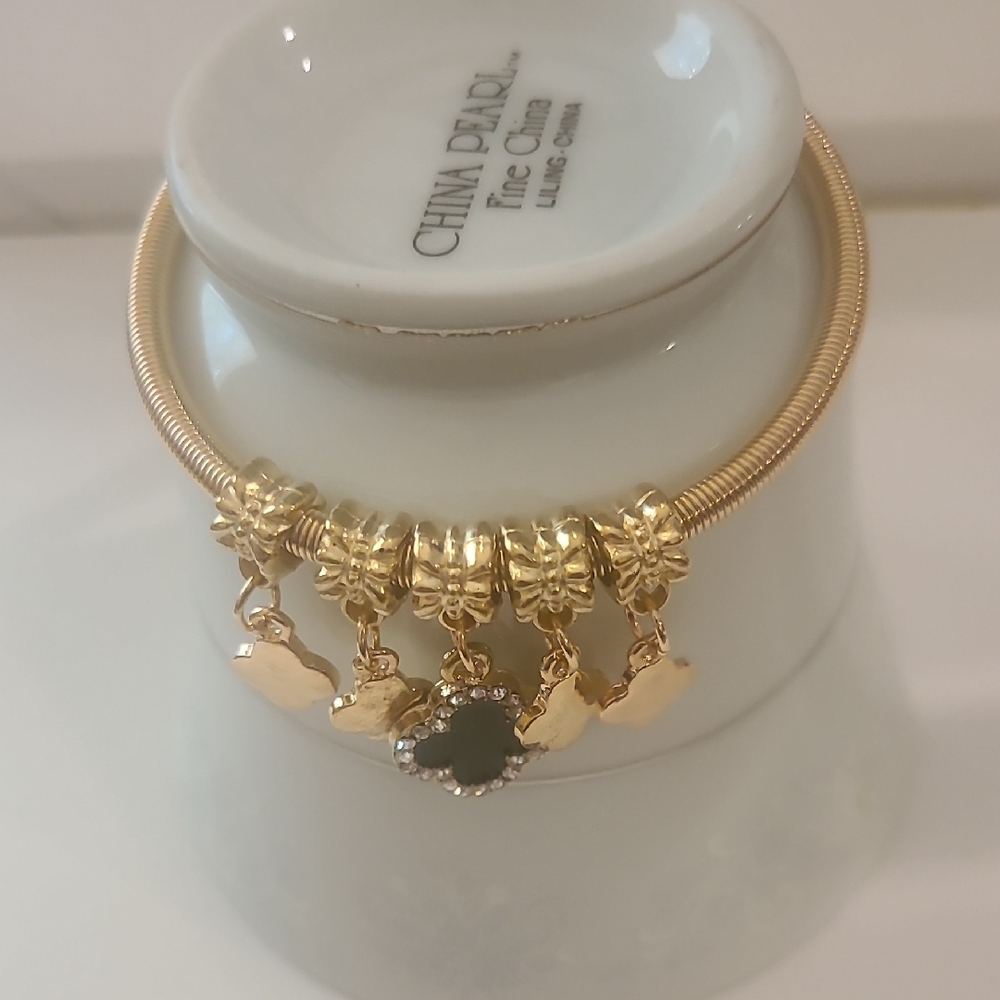 Goldtone Charm Bracelet with Black Clover Centerpiece